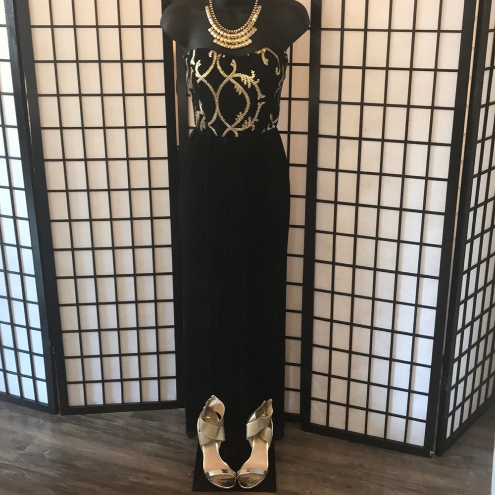 A long black and gold dress